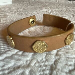 Brown bracelet with gold stud